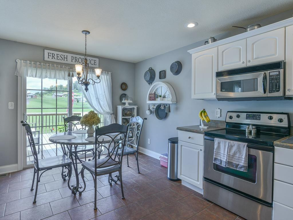 274 Upper Sand Valley Road Jonesborough, TN 37659 - Photo 11 of 36 Eatin kitchen to back deck