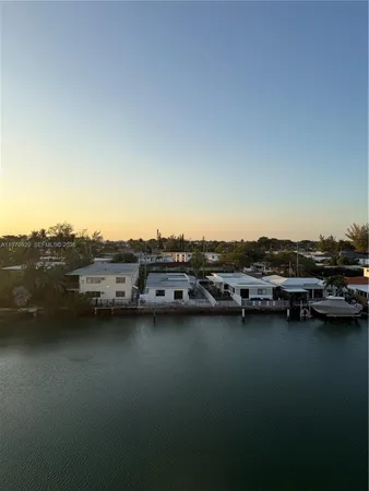a view of a lake with multiple house