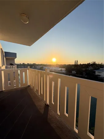 a view of deck with wooden floor and city view