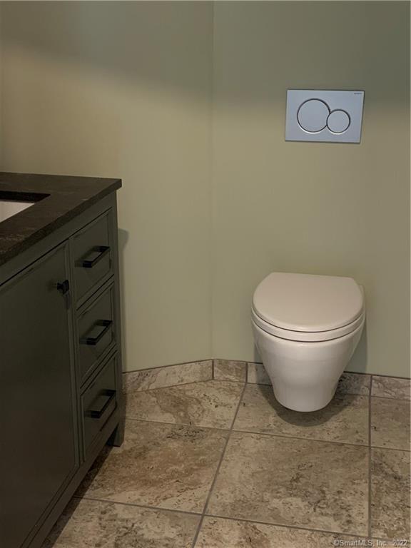 66 Cedar Street, Unit 2 Norwalk, CT 06854 - Photo 8 of 23 a bathroom with a toilet