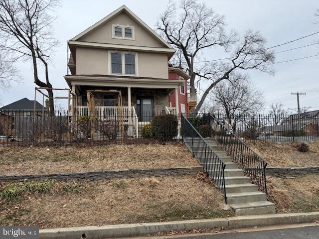 2630 Brentwood Road Northeast Washington, DC 20018 - Photo 2 of 10 a front view of a house with garden