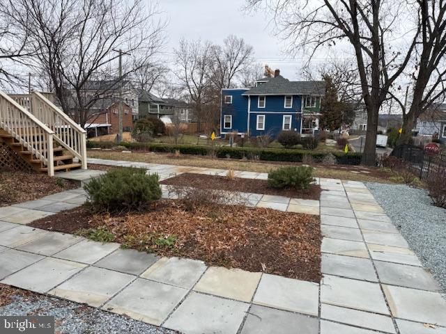 2630 Brentwood Road Northeast Washington, DC 20018 - Photo 4 of 10 a front view of a house with garden