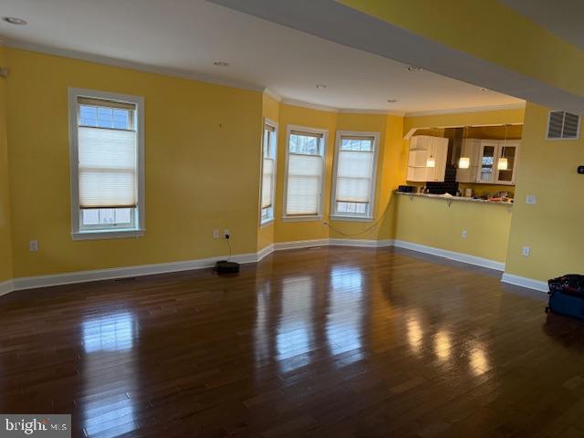 2630 Brentwood Road Northeast Washington, DC 20018 - Photo 6 of 10 a view of empty room with wooden floor and fan