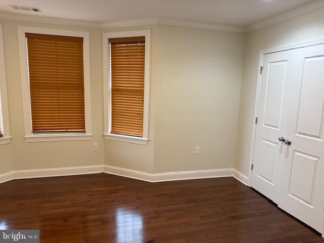 2630 Brentwood Road Northeast Washington, DC 20018 - Photo 8 of 10 a view of an empty room with wooden floor and a window