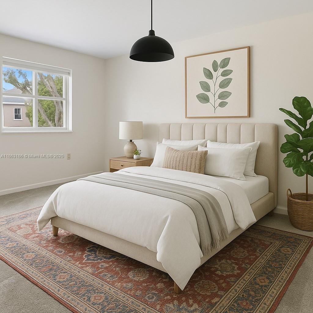 7150 Southwest 55th Terrace West Miami, FL 33155 - Photo 15 of 24 a bedroom with a bed and a painting on the wall