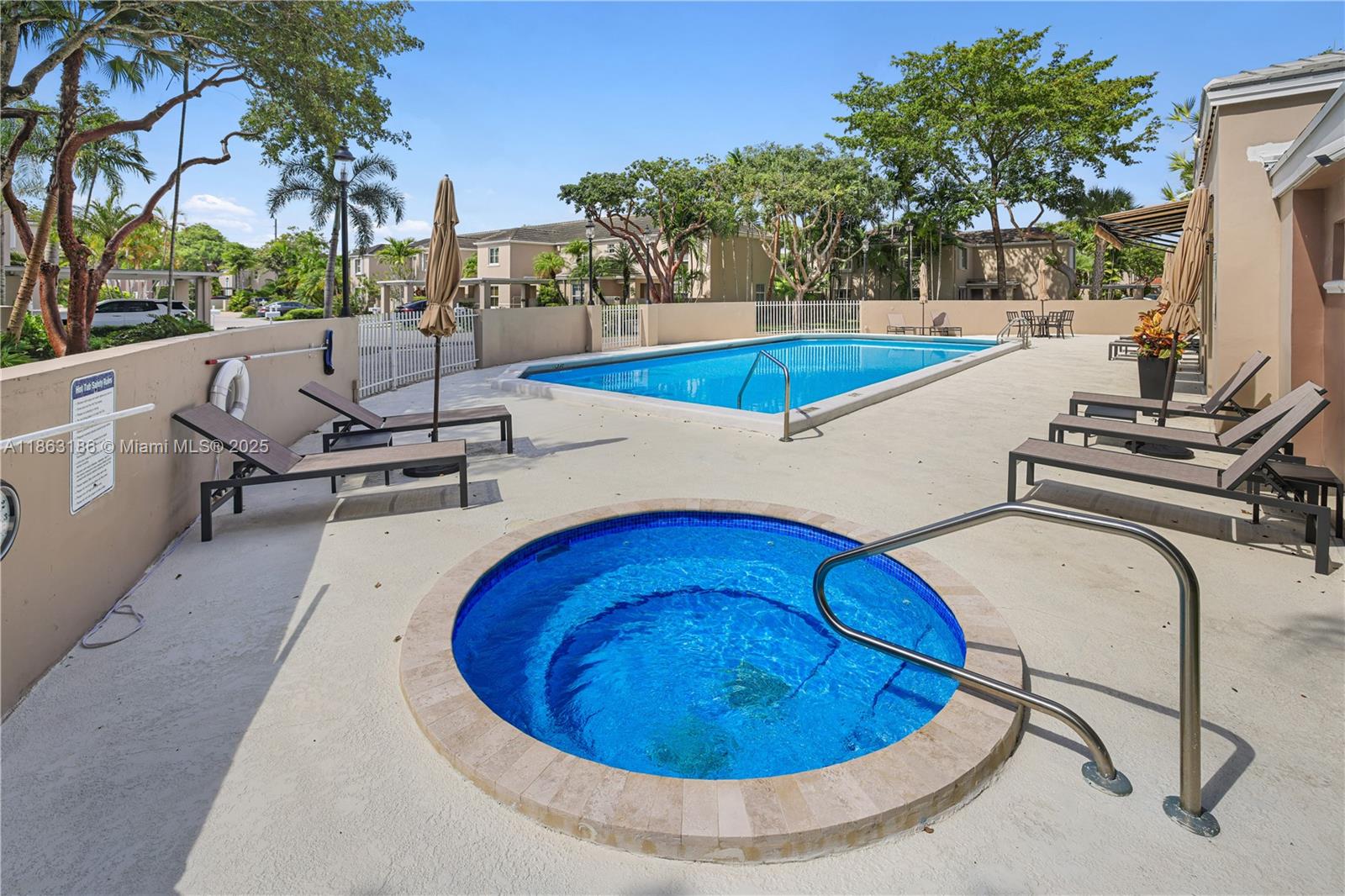7150 Southwest 55th Terrace West Miami, FL 33155 - Photo 21 of 24 a view of a swimming pool with lounge chair
