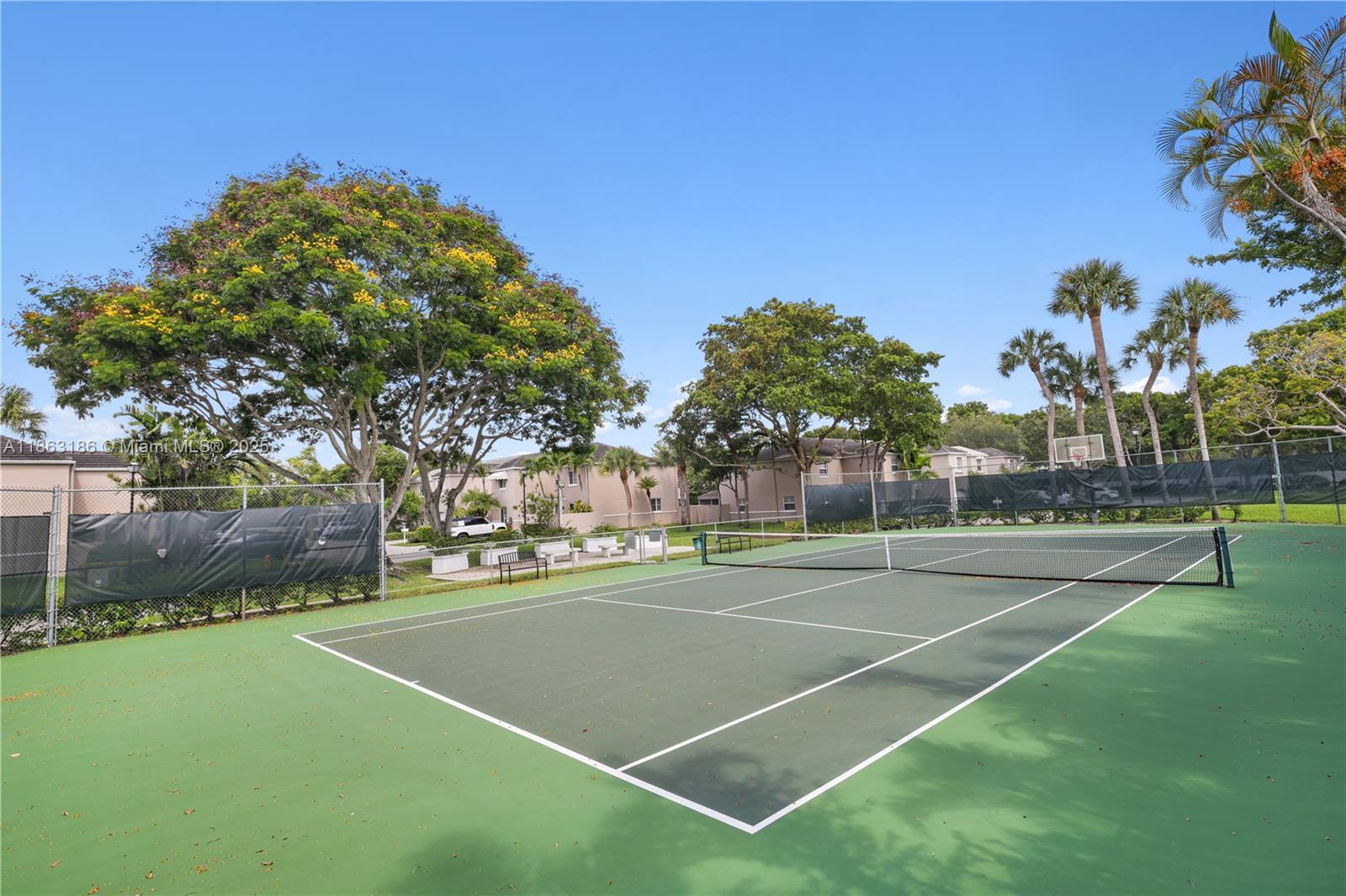 7150 Southwest 55th Terrace West Miami, FL 33155 - Photo 22 of 24 a view of tennis court