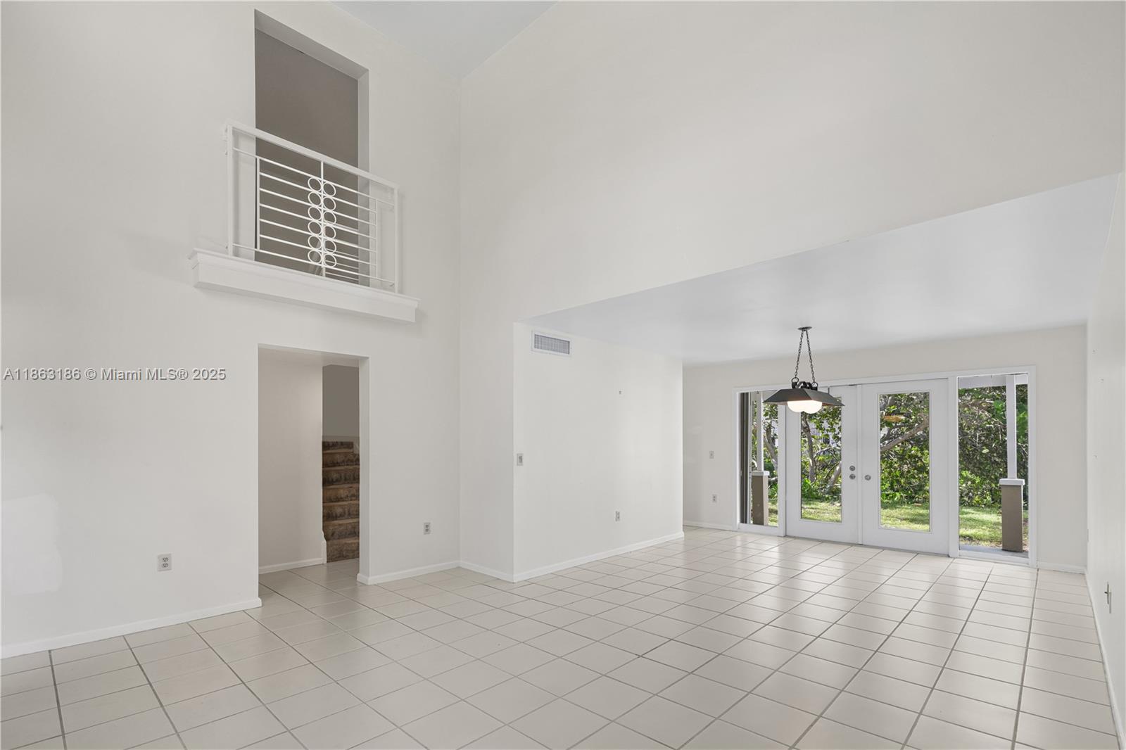 7150 Southwest 55th Terrace West Miami, FL 33155 - Photo 6 of 24 a view of an empty room with window