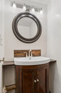 a utility room with a sink a washer and dryer