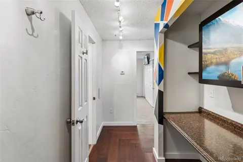 a hallway with washer and dryer