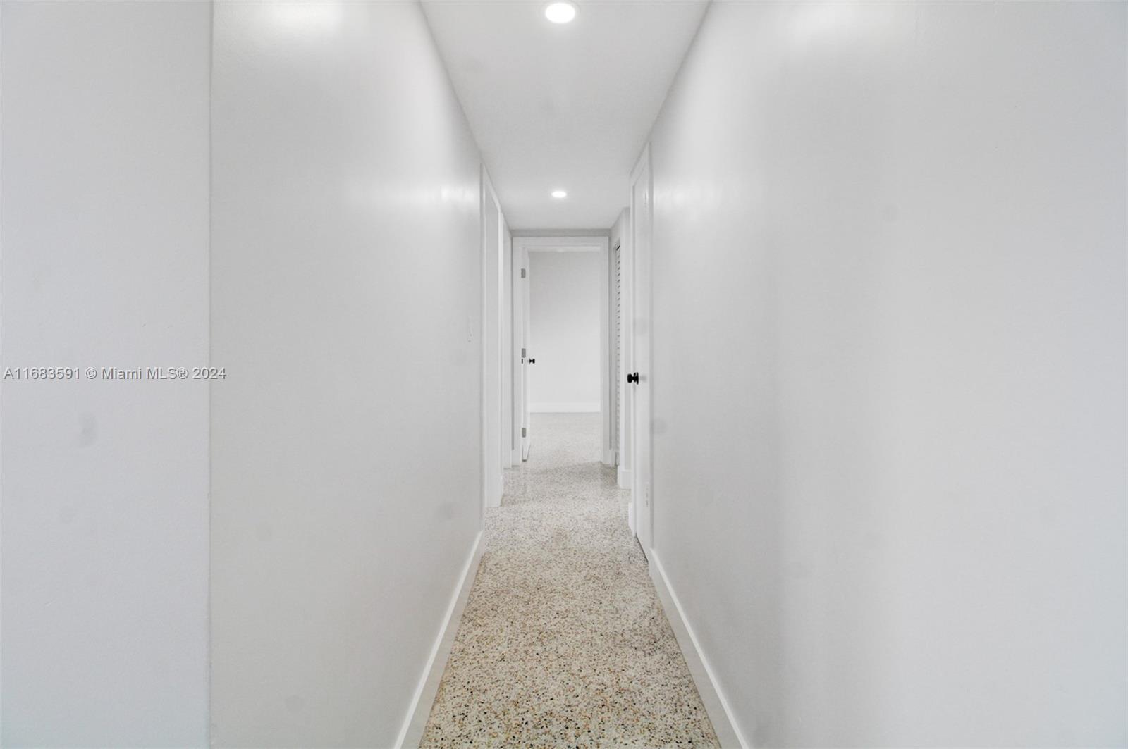 7120 Southwest 9th Street Miami, FL 33144 - Photo 14 of 25 a view of a hallway