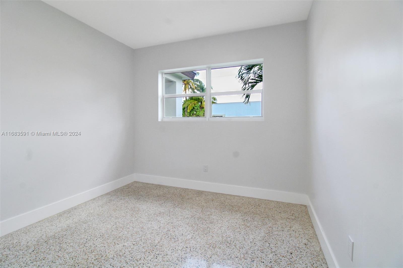 7120 Southwest 9th Street Miami, FL 33144 - Photo 15 of 25 a small space with a window