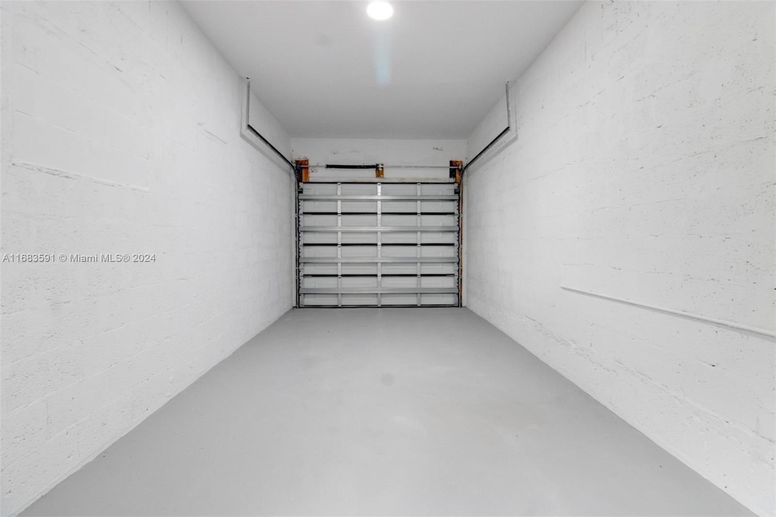 7120 Southwest 9th Street Miami, FL 33144 - Photo 19 of 25 a view of walk in closet with empty racks