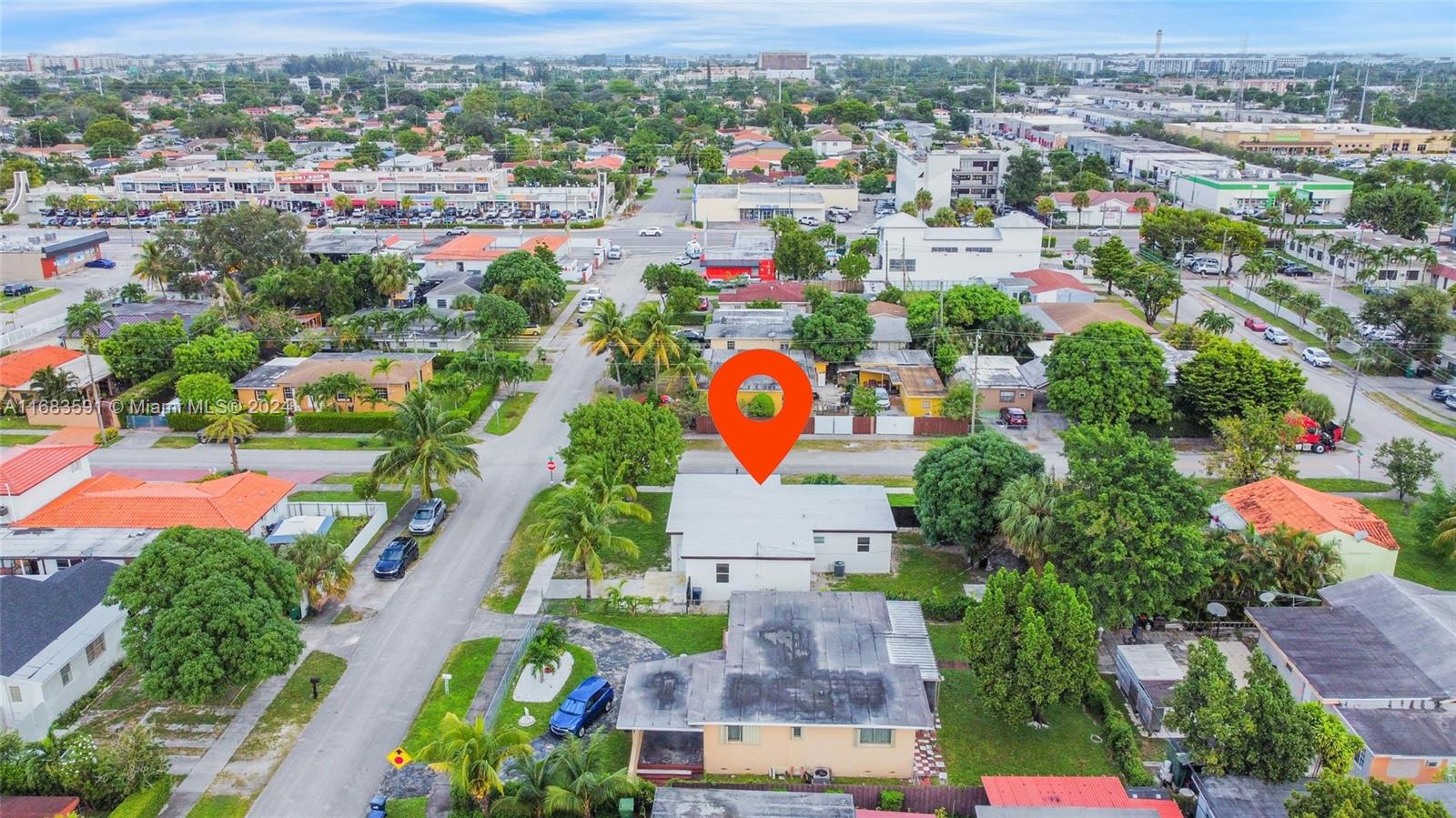 7120 Southwest 9th Street Miami, FL 33144 - Photo 24 of 25 an aerial view of residential houses with outdoor space and parking