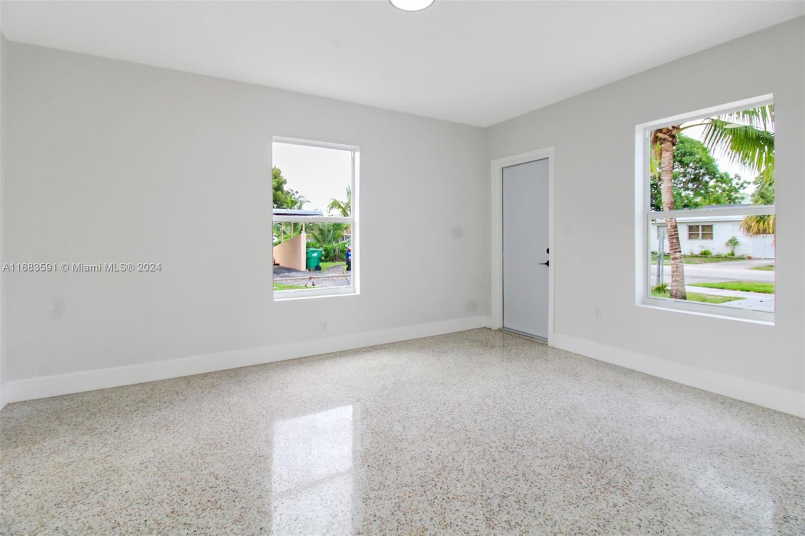 7120 Southwest 9th Street Miami, FL 33144 - Photo 9 of 25 a view of a window in a room