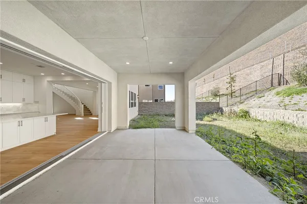 a view of a pathway with a yard