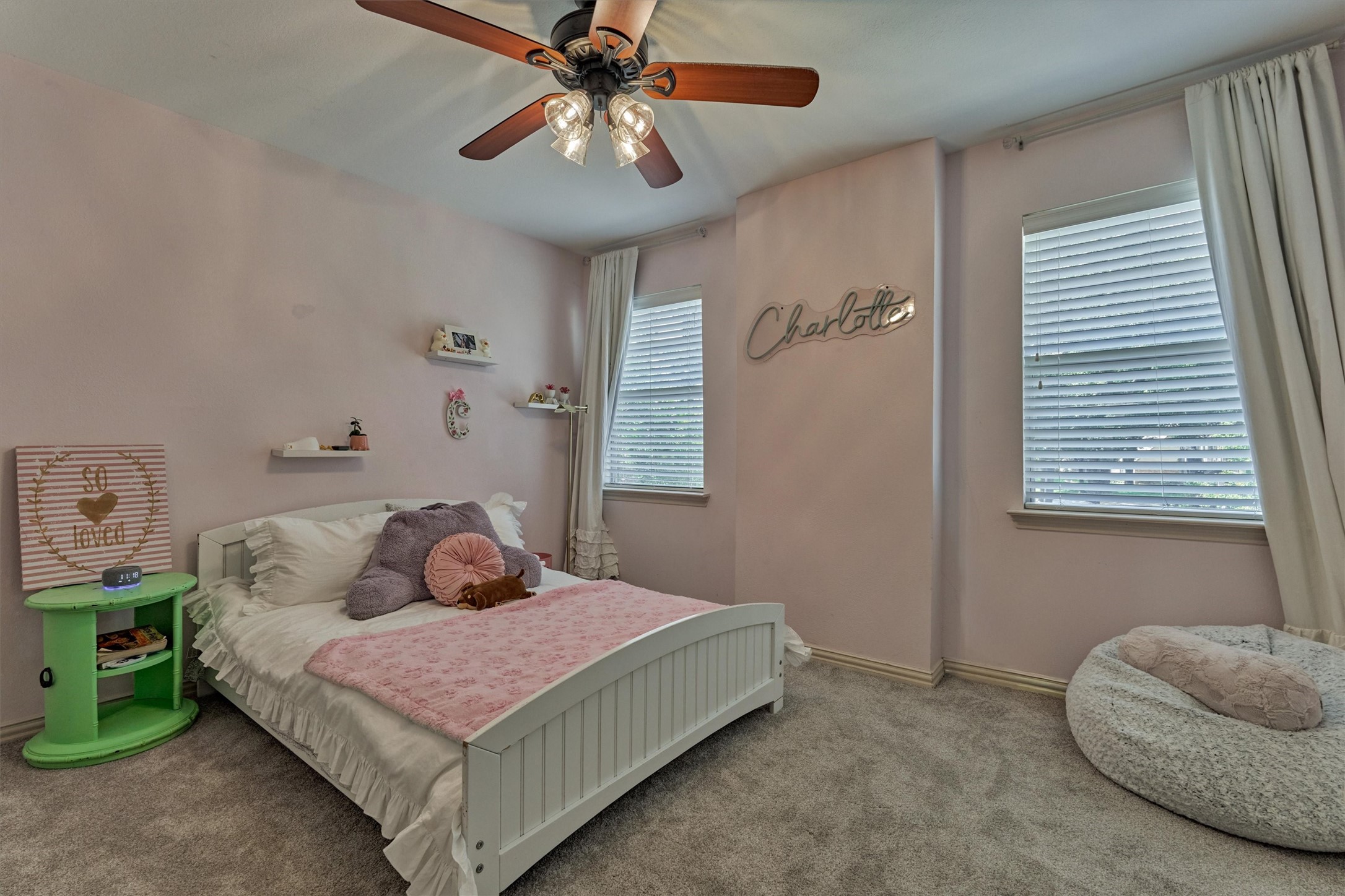 6515 Glenhill Drive Spring, TX 77389 - Photo 27 of 39 a bedroom with a bed and a chandelier