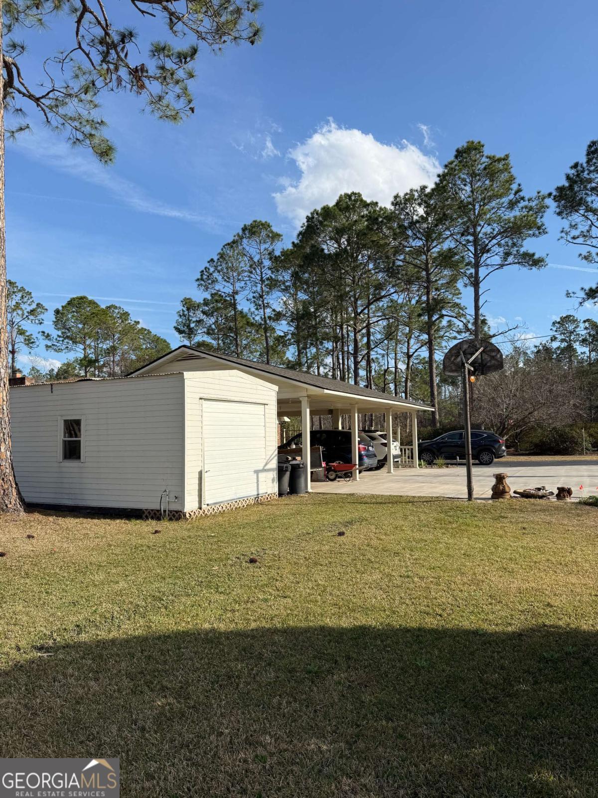 5686 Golden Isle West Baxley, GA 31513 - Photo 16 of 122 a view of a house with a yard