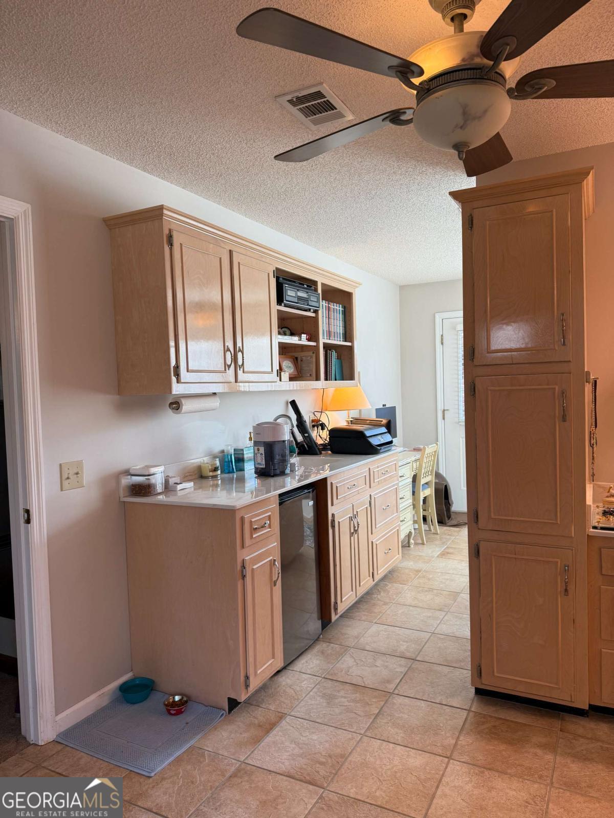 5686 Golden Isle West Baxley, GA 31513 - Photo 76 of 122 a kitchen with stainless steel appliances granite countertop a refrigerator and a stove