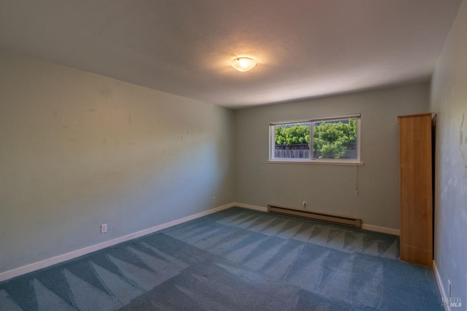 1550 Yountville Cross Road Napa, CA 94558 - Photo 28 of 45 an empty room with a window