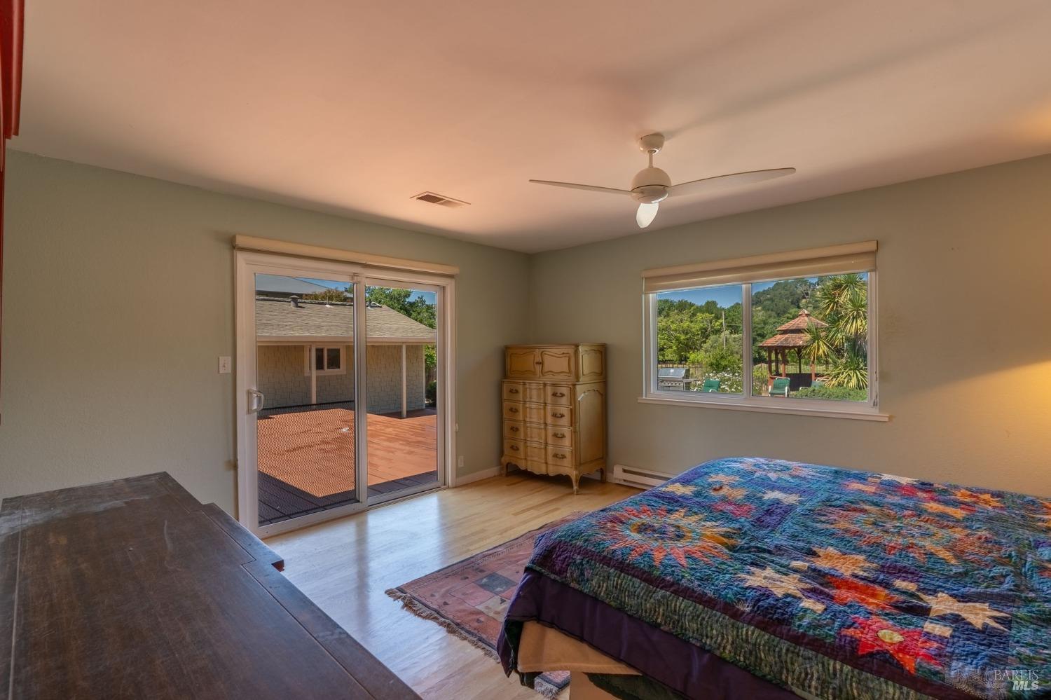 1550 Yountville Cross Road Napa, CA 94558 - Photo 37 of 45 a bedroom with furniture and a rug