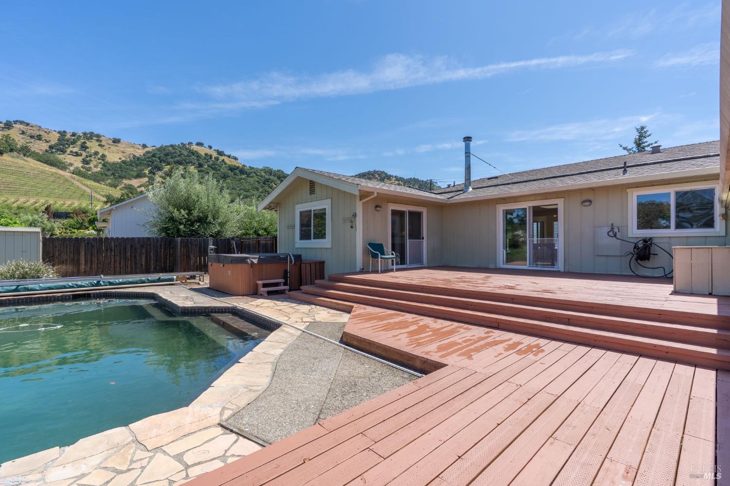 1550 Yountville Cross Road Napa, CA 94558 - Photo 40 of 45 a view of a house with swimming pool and sitting area