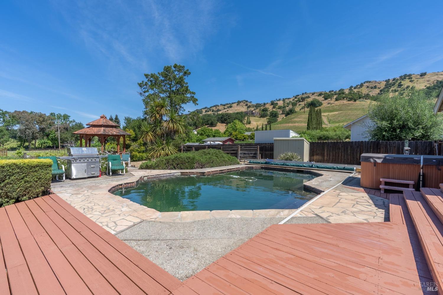1550 Yountville Cross Road Napa, CA 94558 - Photo 41 of 45 a view of a backyard with sitting area