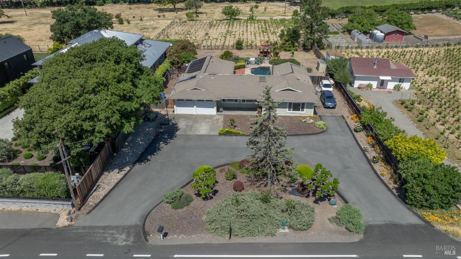 1550 Yountville Cross Road Napa, CA 94558 - Photo 5 of 45 an aerial view of a house with a yard