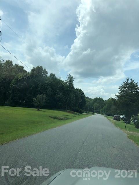 a view of a golf course with a lake