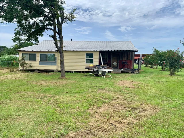 a view of a lake with a big yard