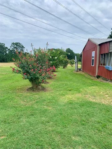 a outdoor space with lots of table and chairs