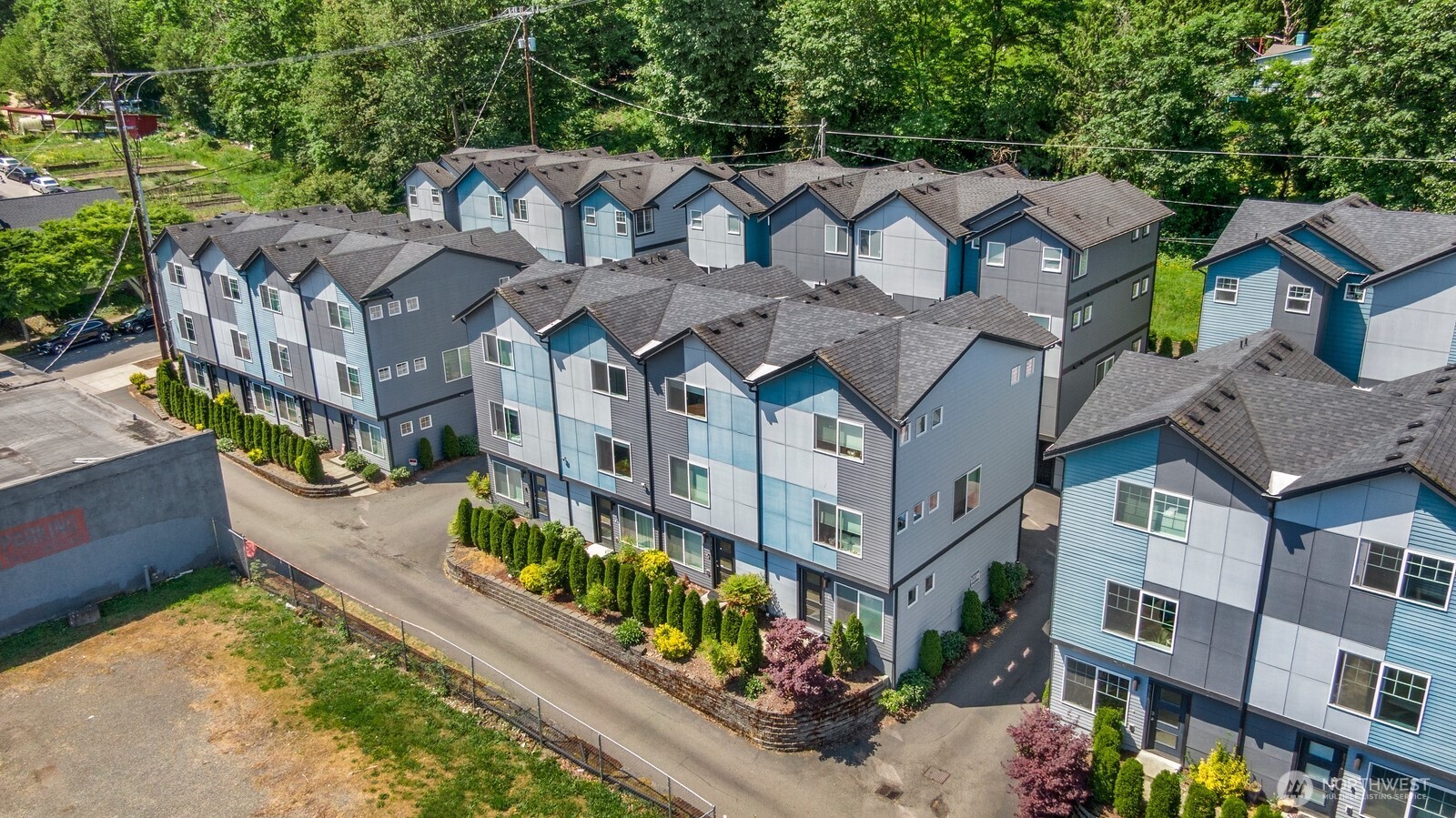2736 South Andover Street Seattle, WA 98108 - Photo 23 of 24 a view of a large building in front of a yard
