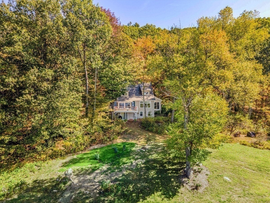 261 Old Wendell Road Northfield, MA 01360 - Photo 2 of 42 a view of a house with a yard