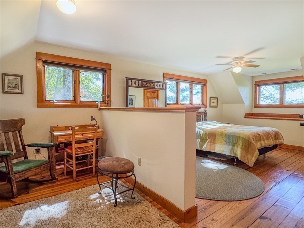 261 Old Wendell Road Northfield, MA 01360 - Photo 22 of 42 a bedroom with furniture and a window
