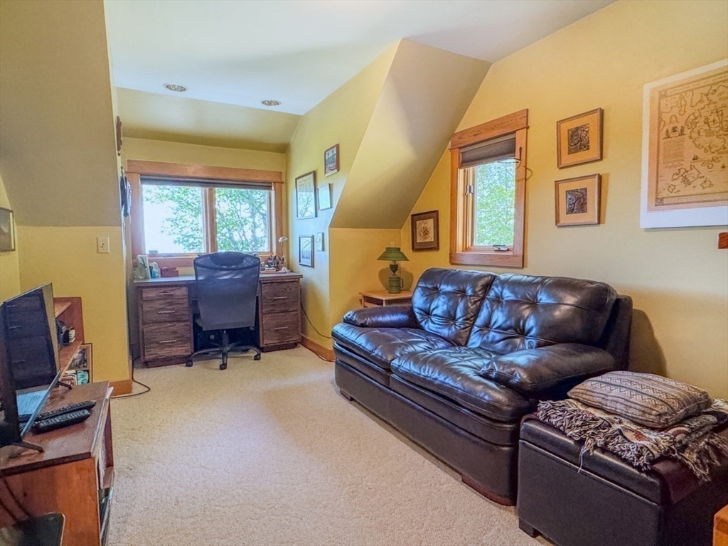 261 Old Wendell Road Northfield, MA 01360 - Photo 23 of 42 a living room with furniture ceiling window and a fireplace