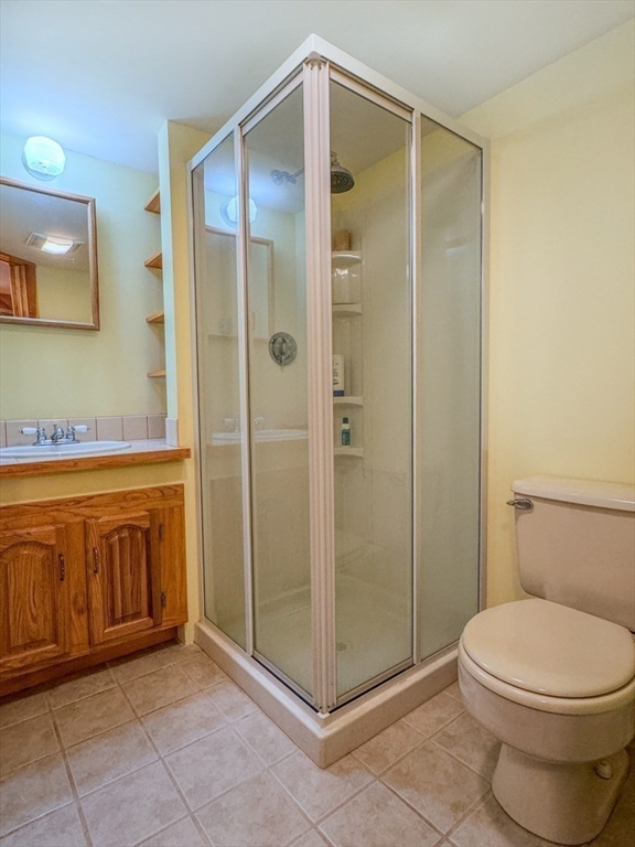 261 Old Wendell Road Northfield, MA 01360 - Photo 30 of 42 a bathroom with a shower and a toilet