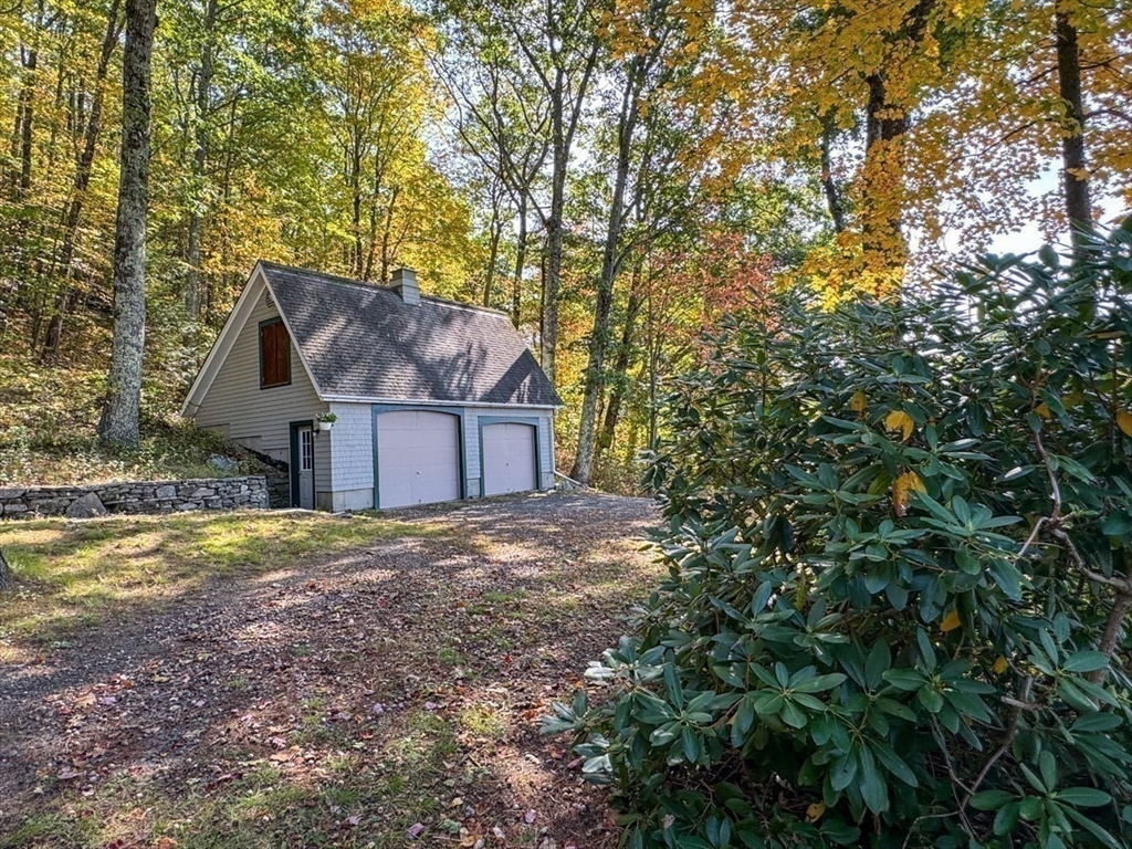 261 Old Wendell Road Northfield, MA 01360 - Photo 38 of 42 a view of a house with a yard and large tree