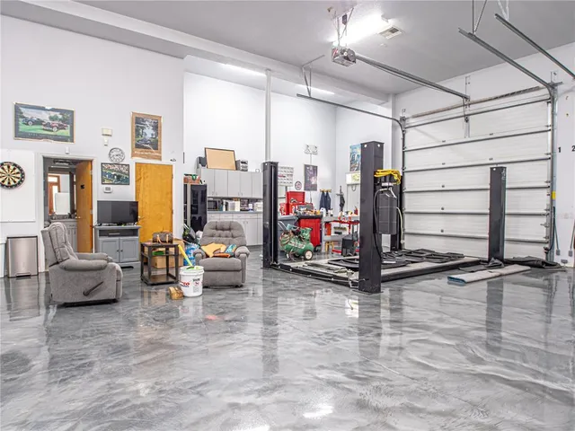 a view of a dining room with furniture and window