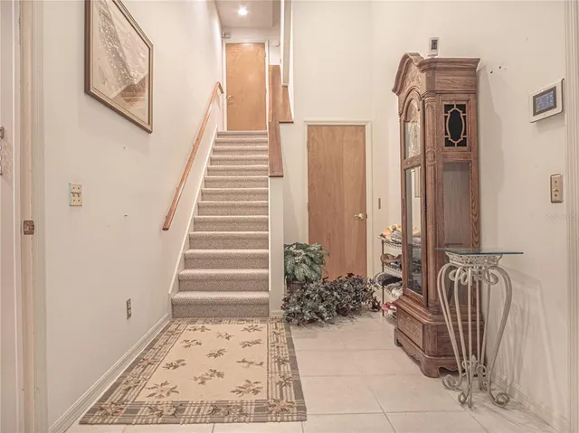 a bathroom with a toilet a sink and a mirror