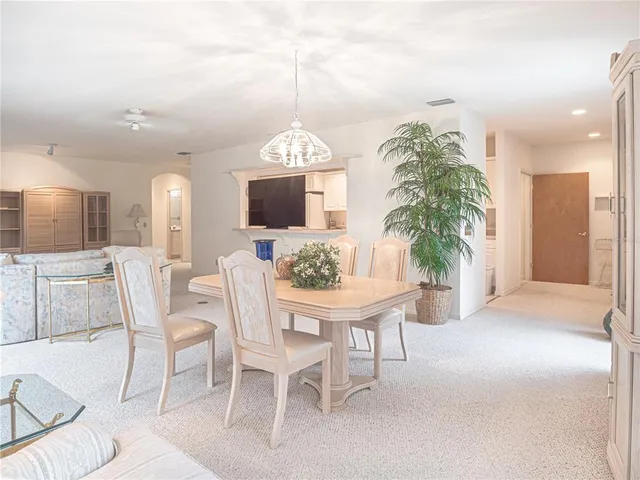 a bedroom with a bed and dresser