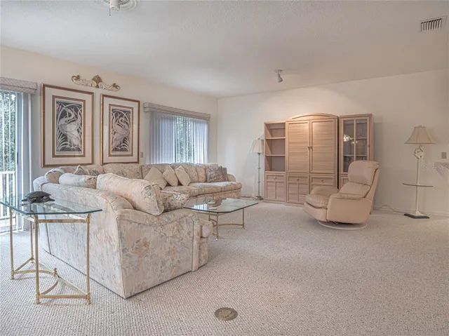 a bedroom with bed and a couch