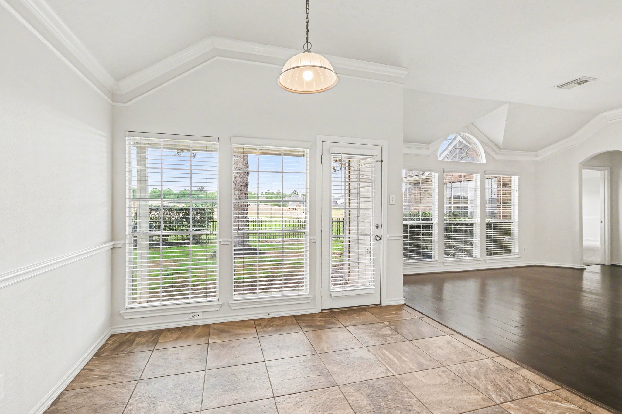 16434 Redcrest Drive Houston, TX 77095 - Photo 14 of 44 Breakfast nook looks out to the patio, back yard and golf course as well as open to the kitchen and family room which makes it an ideal place to gather.