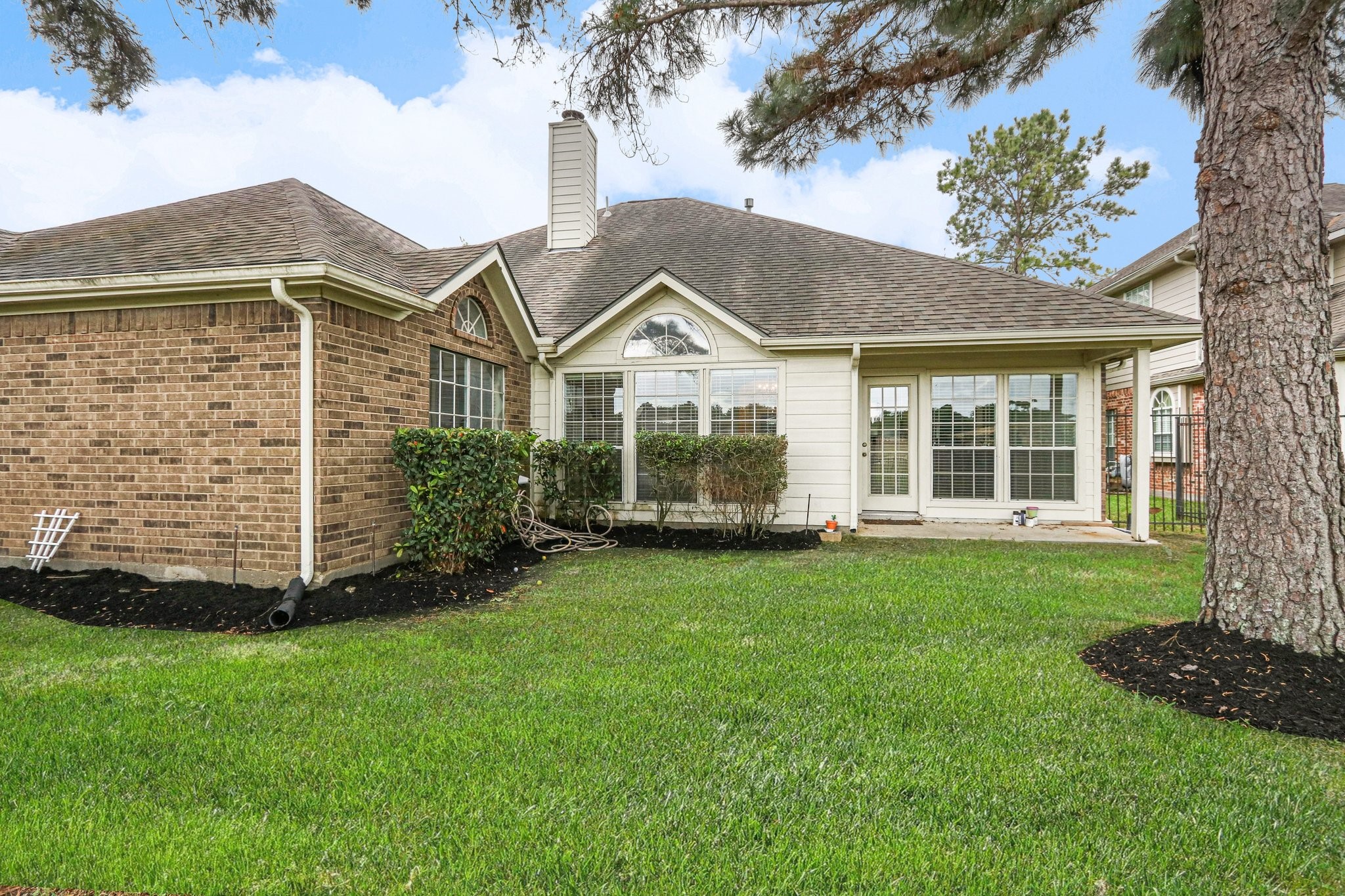 16434 Redcrest Drive Houston, TX 77095 - Photo 30 of 44 Small covered rear patio could easily be extended even with a pool addition.