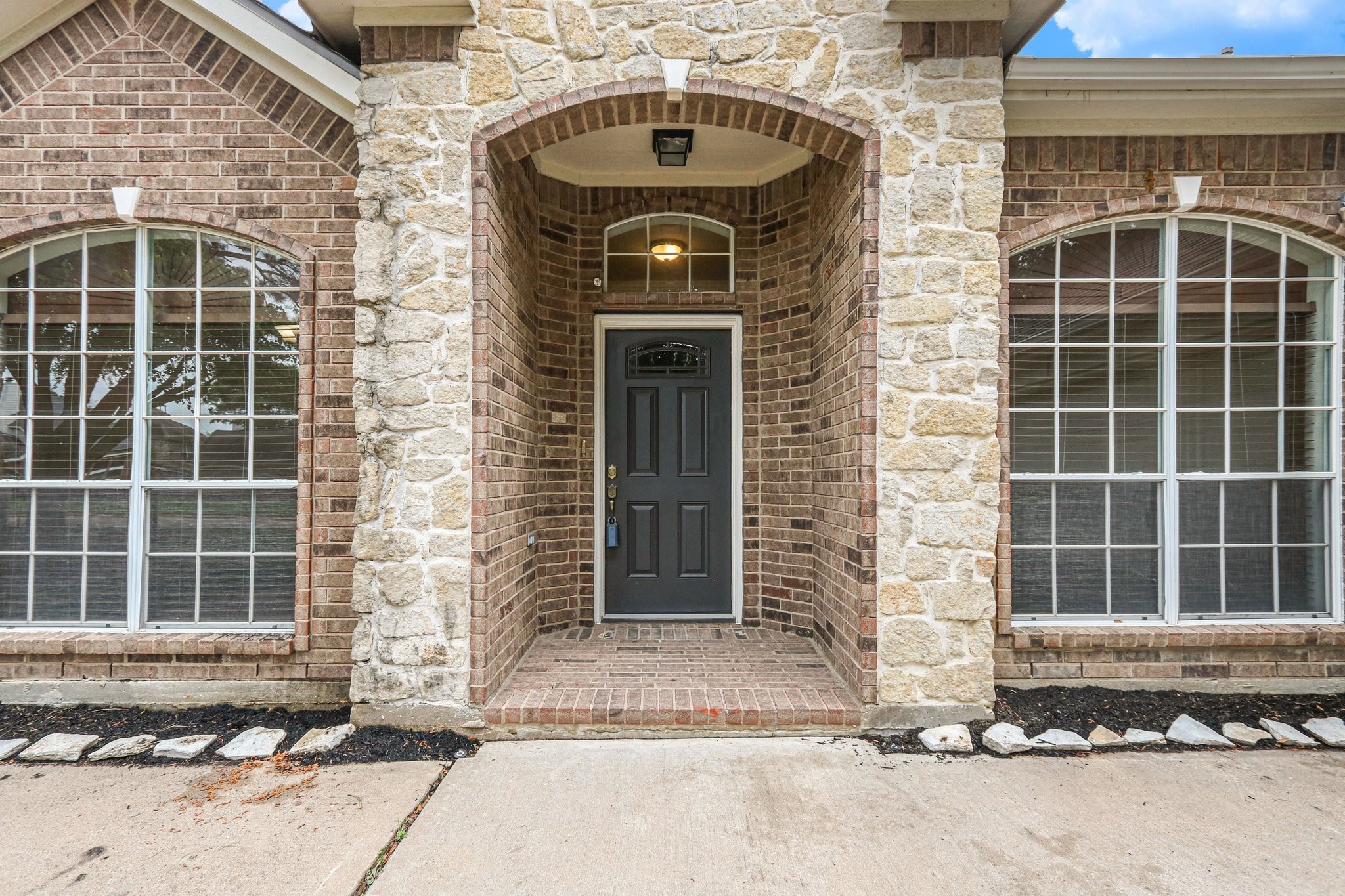 16434 Redcrest Drive Houston, TX 77095 - Photo 33 of 44 Stone and brick entry.