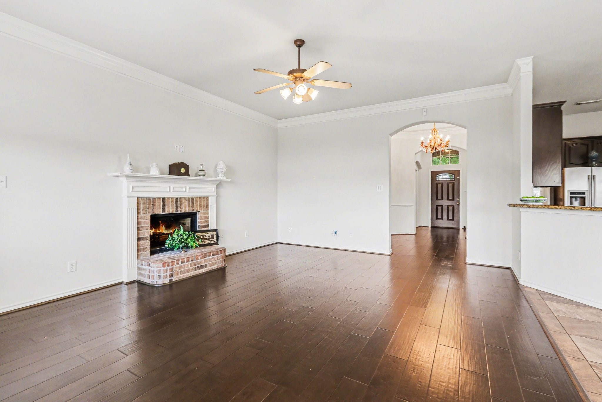 16434 Redcrest Drive Houston, TX 77095 - Photo 9 of 44 Open family room with fireplace and room for a TV over the mantle.