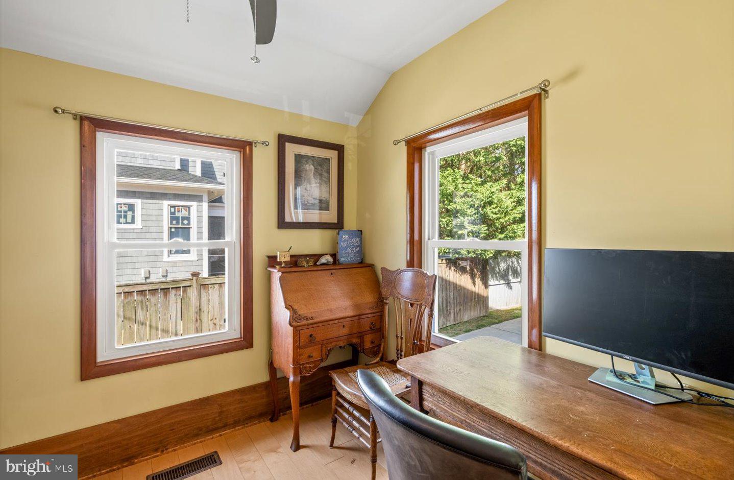 223 Rodney Street Rehoboth Beach, DE 19971 - Photo 11 of 59 a workspace with furniture and window