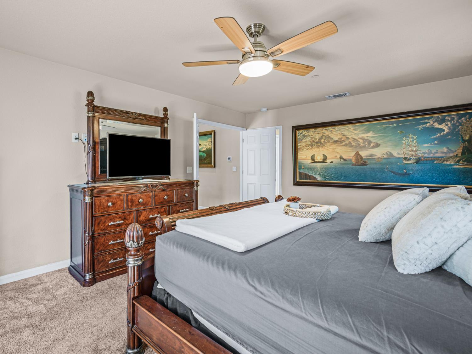 5031 Shooting Star Road Pollock Pines, CA 95726 - Photo 22 of 53 bedroom with light carpet and ceiling fan