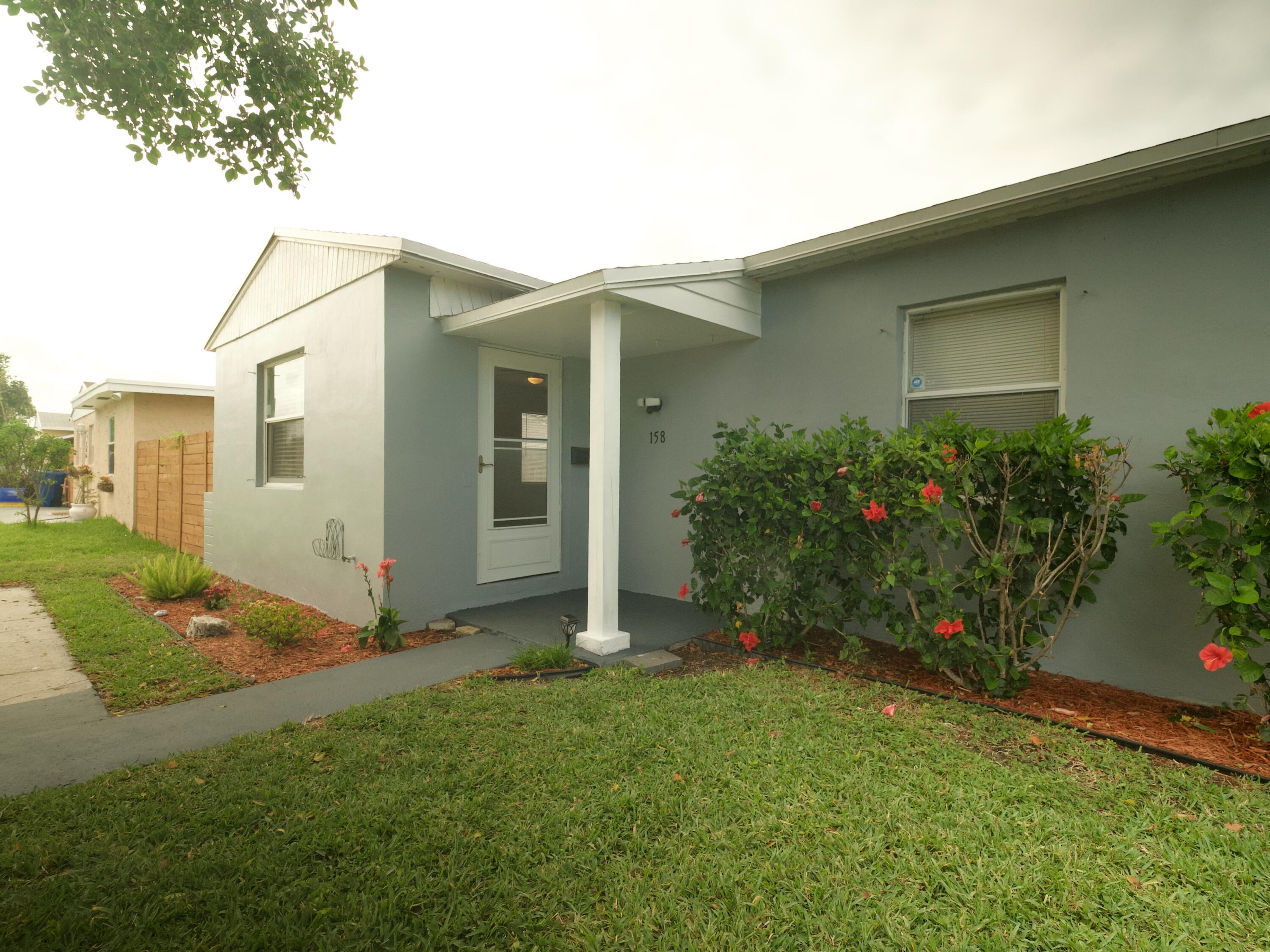 158 West 25th Street Riviera Beach, FL 33404 - Photo 3 of 24 43 - 22