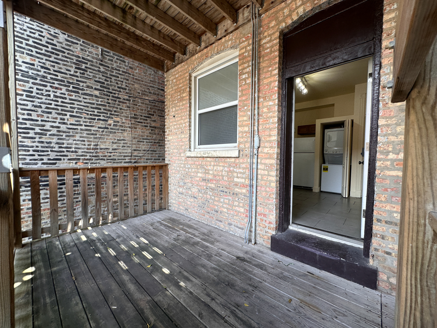 2126 North Sheffield Avenue, Unit 1 Chicago, IL 60614 - Photo 24 of 24 a view of wooden balcony