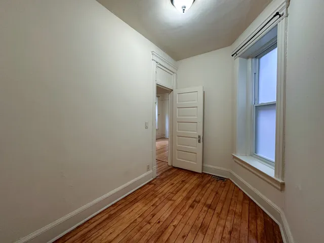 wooden floor and cabinet in a room